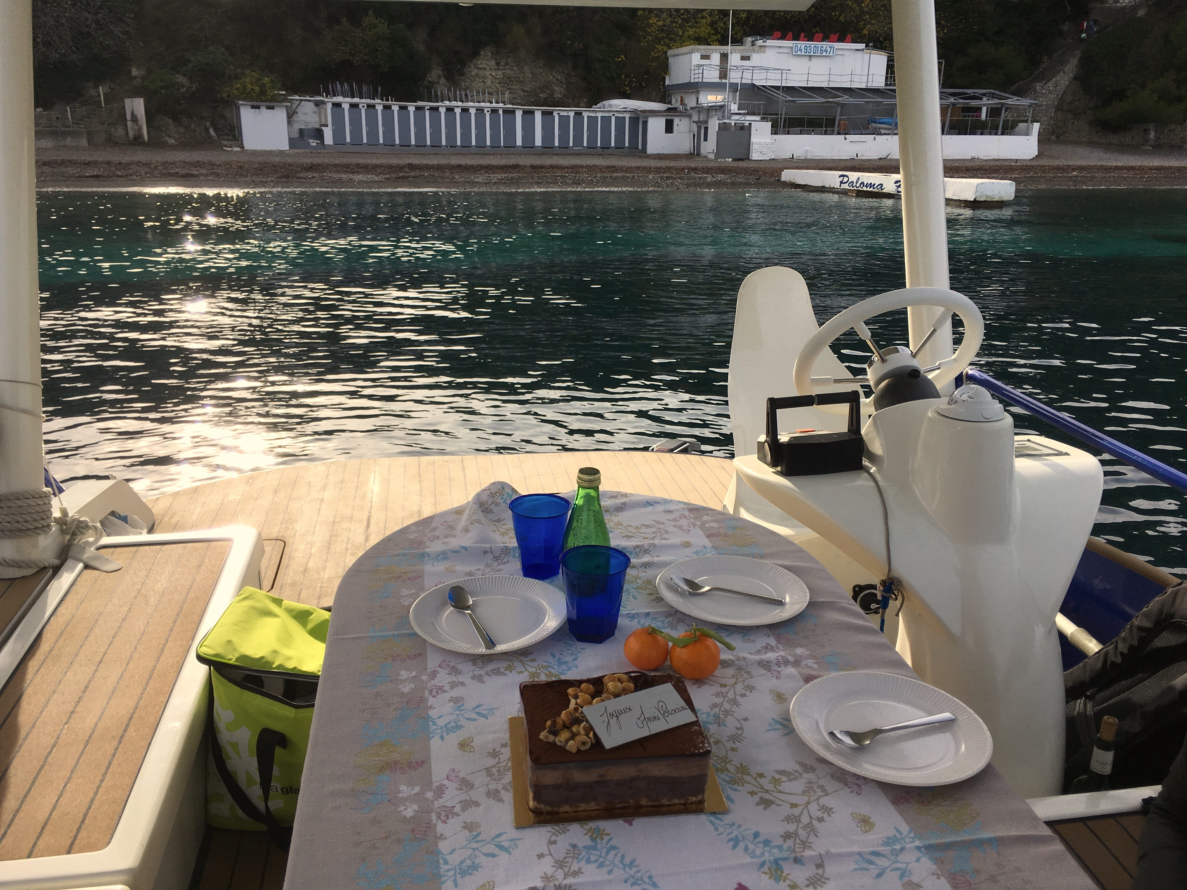 Tasting a birthday cake with family on the seaZen solar boat